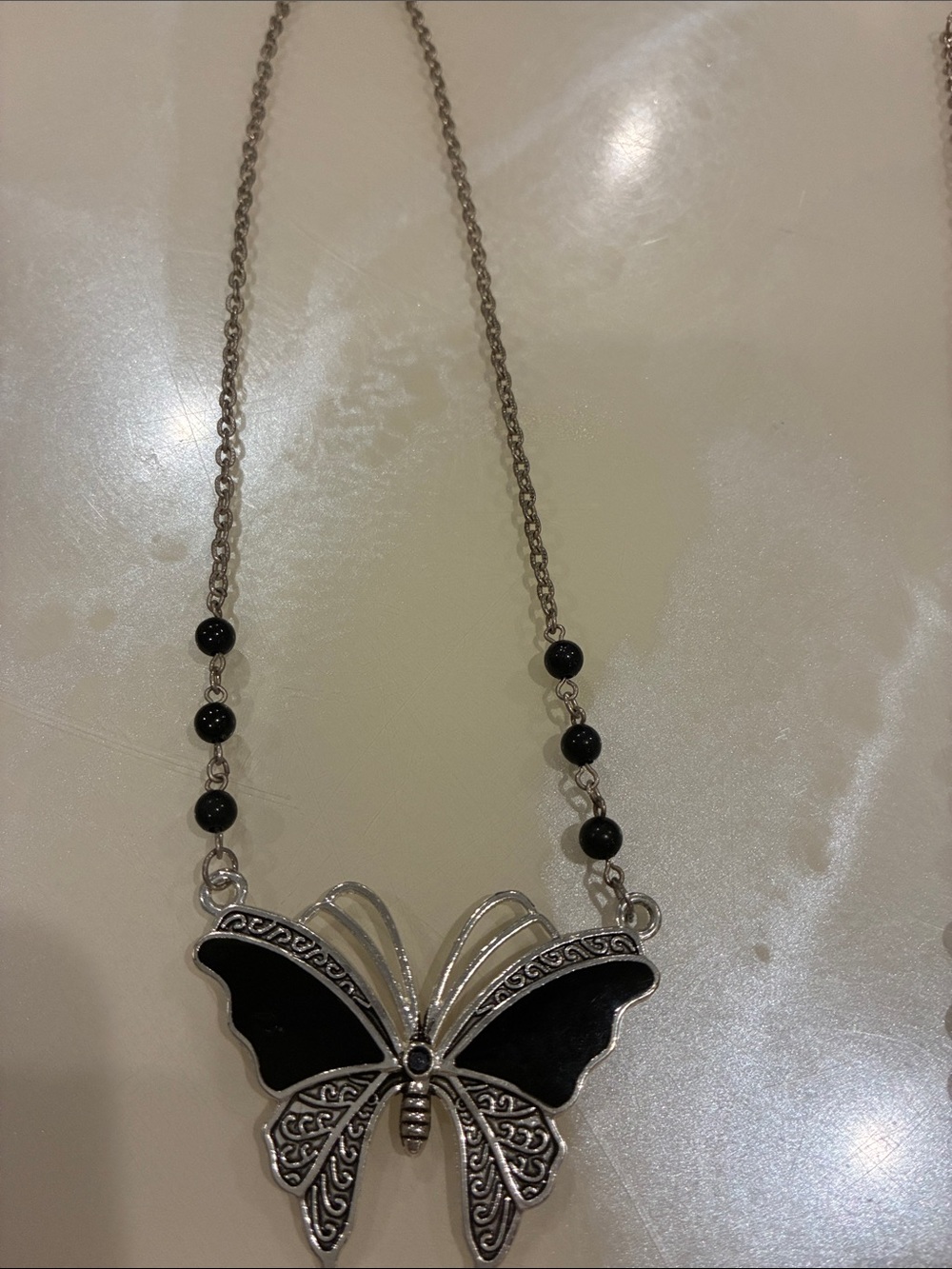 Silver-tone Butterfly Pendant Necklace with Black Enamel